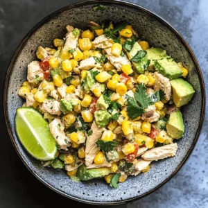 chicken avocado corn salad served in bowl