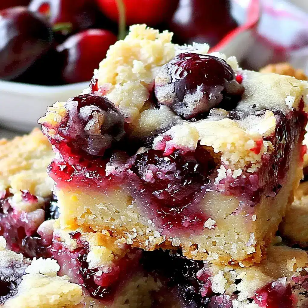 Freshly baked cherry pie bars in glass pan