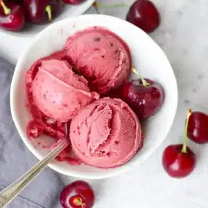 Fresh Cherry Sorbet recipe card with ingredients, instructions, and a vibrant image of the sorbet.