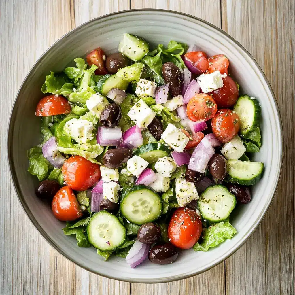 Lettuce for Greek salad with fresh vegetables, feta cheese, and olives